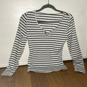 black and white striped long sleeve shirt.